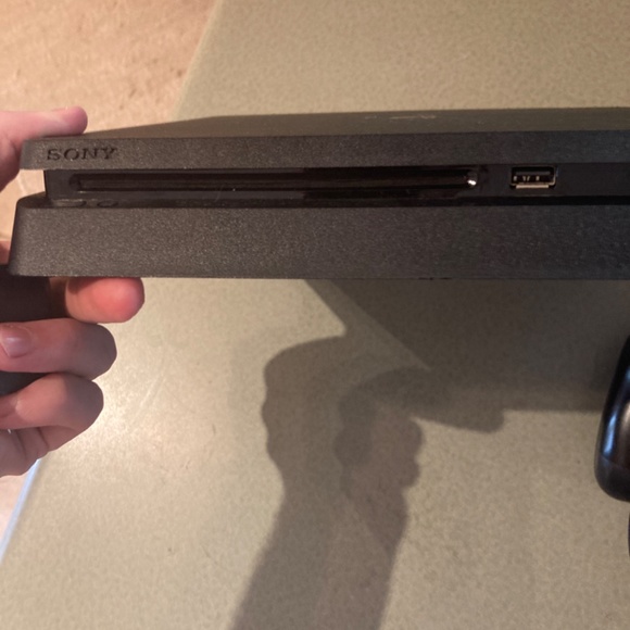 Barely used Sony PlayStation 4 slim jet black